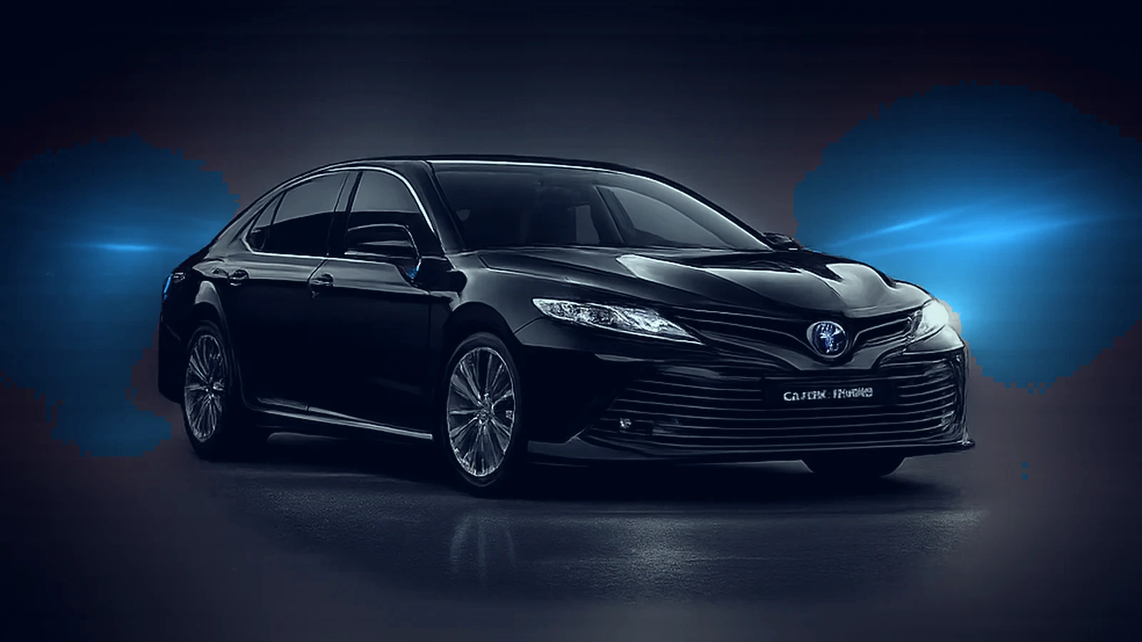 Czarna Toyota Camry z przyciemnionymi tylnymi szybami